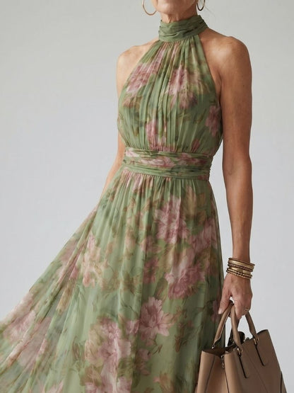 Mirella | Abito midi floreale con scollo halter e vita segnata
