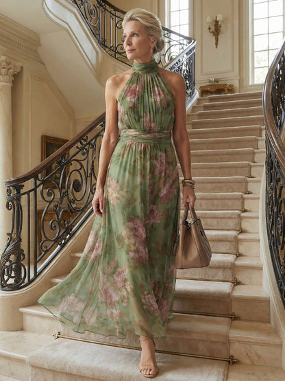 Mirella | Abito midi floreale con scollo halter e vita segnata