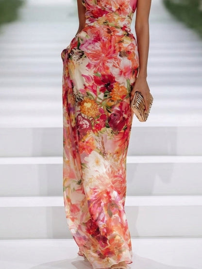 Letizia | Maxi abito floreale con scollo halter e vita segnata
